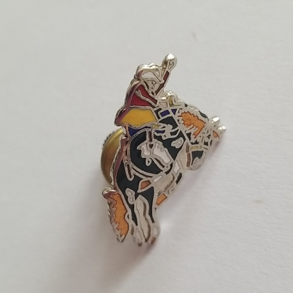 Cowboy riding horse